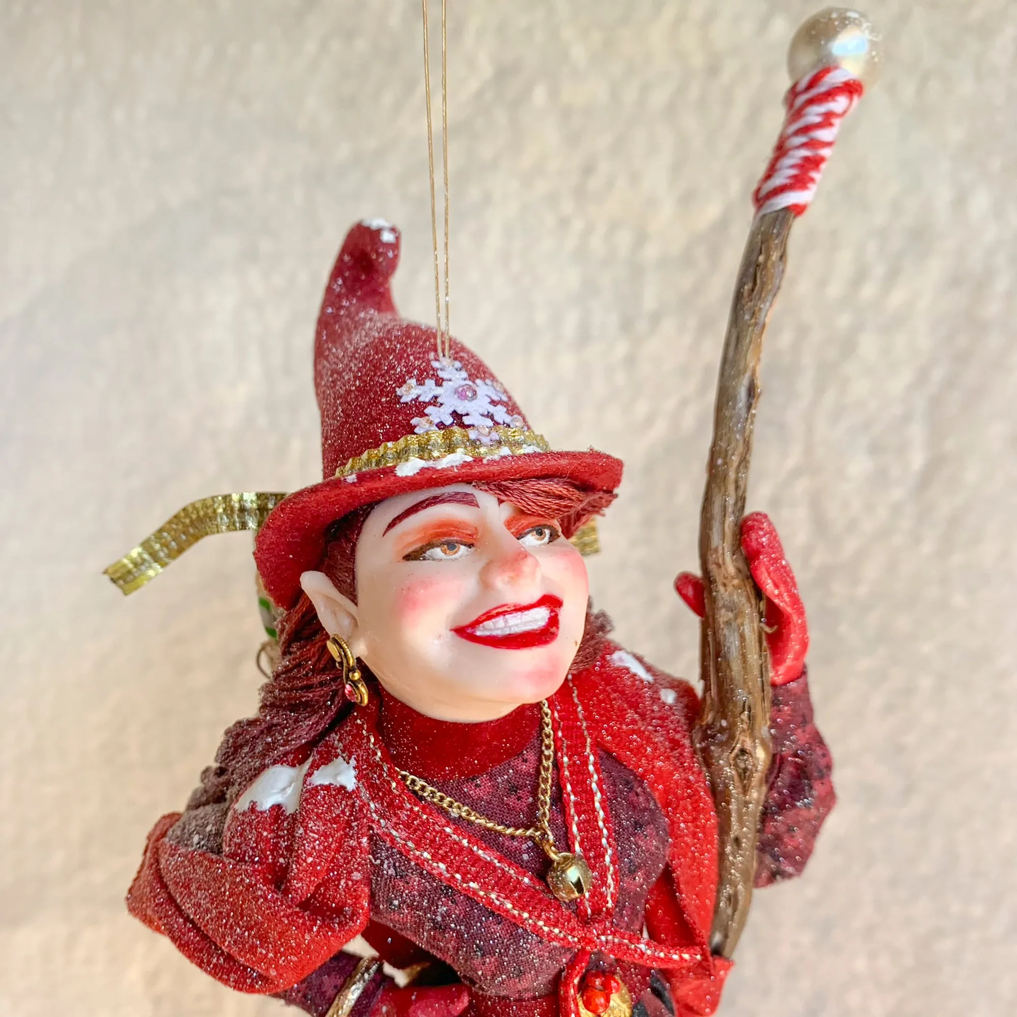La Bafana - Hovering on her broom Christmas eve waiting to deliver a basket full of Christmas gifts - Hanging Ornament
