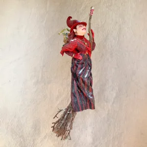 La Bafana - Hovering on her broom Christmas eve waiting to deliver a basket full of Christmas gifts - Hanging Ornament