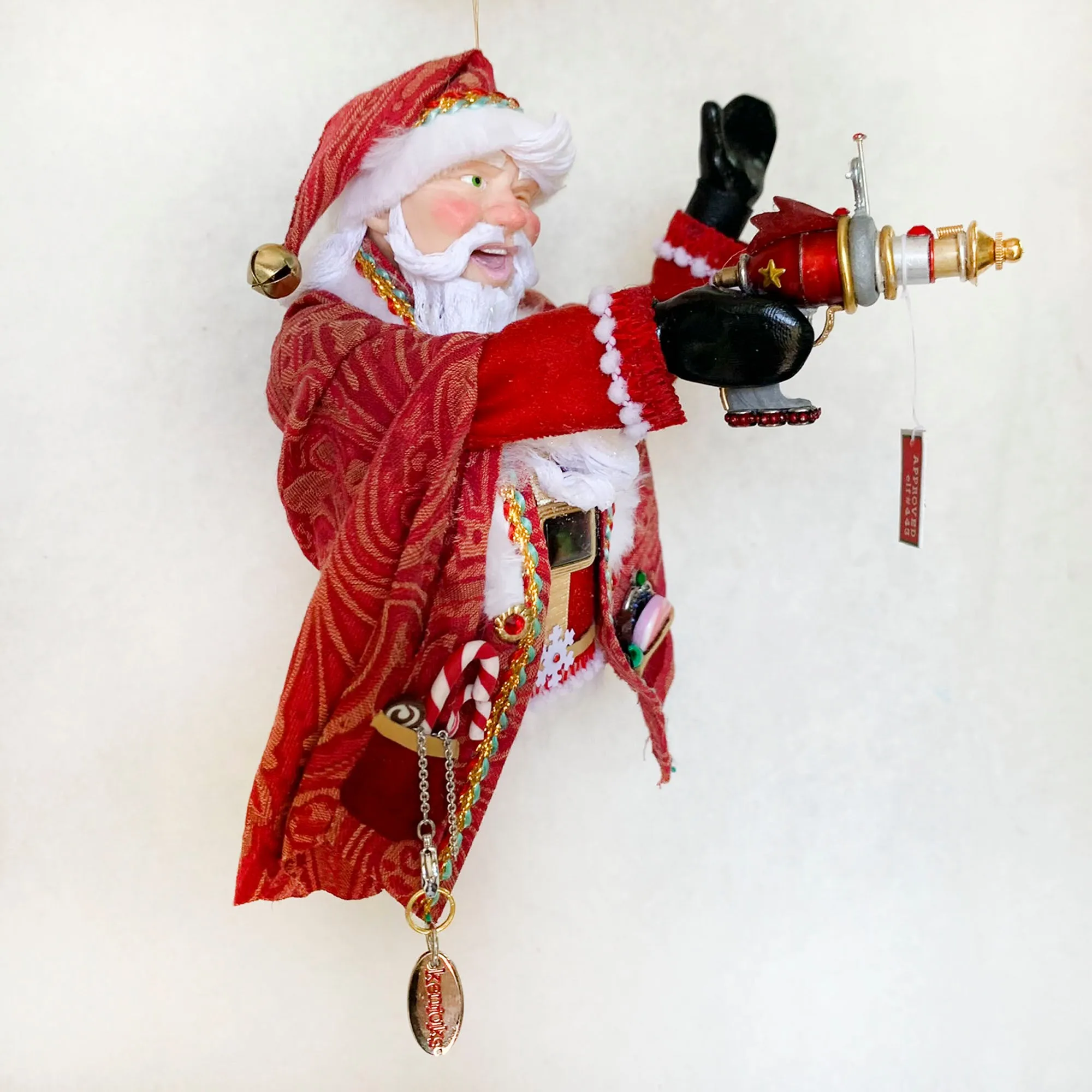 Santa Claus with testing and playing with a space Ray Gun - Christmas Decoration - Beautiful Santa