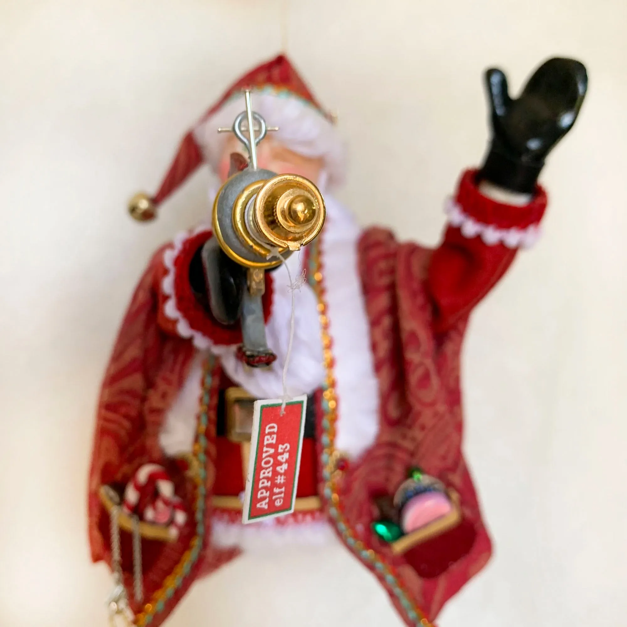 Santa Claus with testing and playing with a space Ray Gun - Christmas Decoration - Beautiful Santa